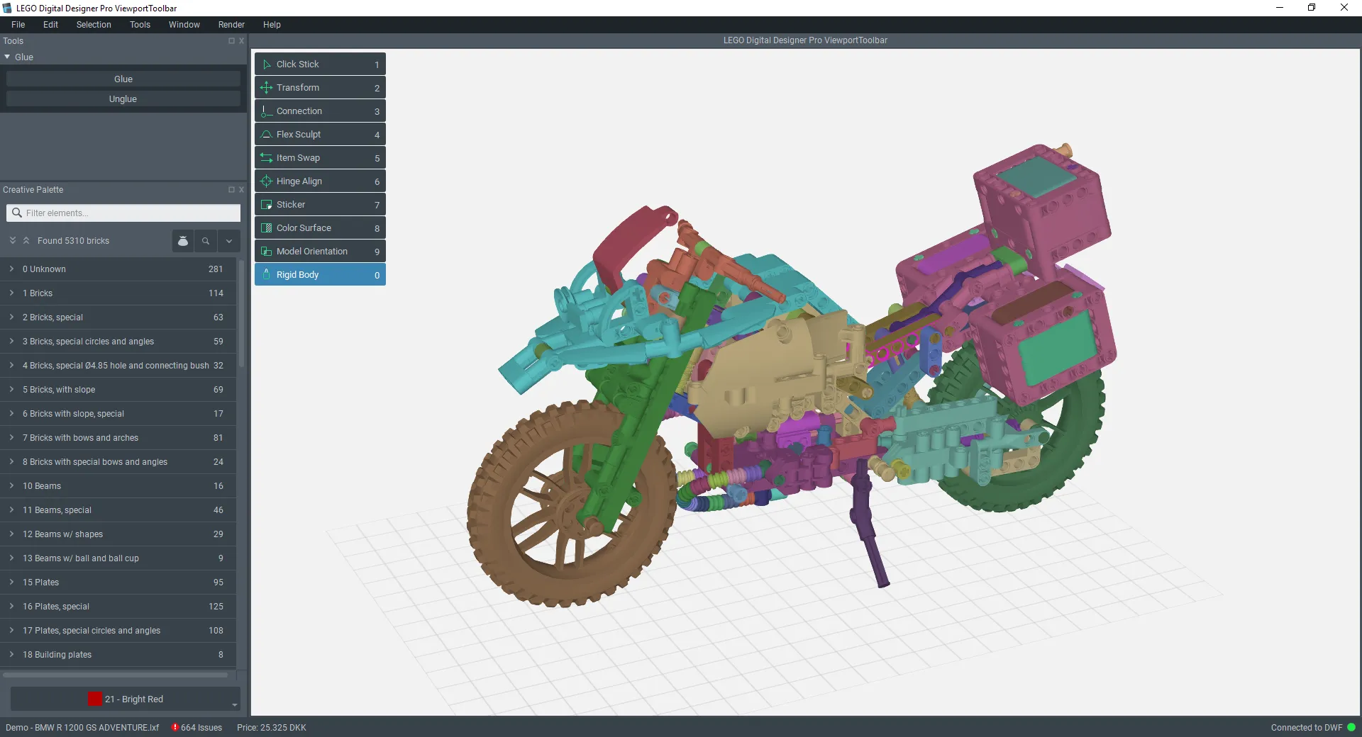 LEGO Digital Designer Pro showing a colourful LEGO Technic motorcycle model, with the Rigid Body tool selected and the creative palette of brick categories on the left